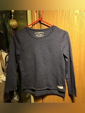 Buffalo David Bitton blue lightweight sweatshirt with raw hem details.